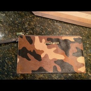 Michael Kors camouflage faux fur wristlet.